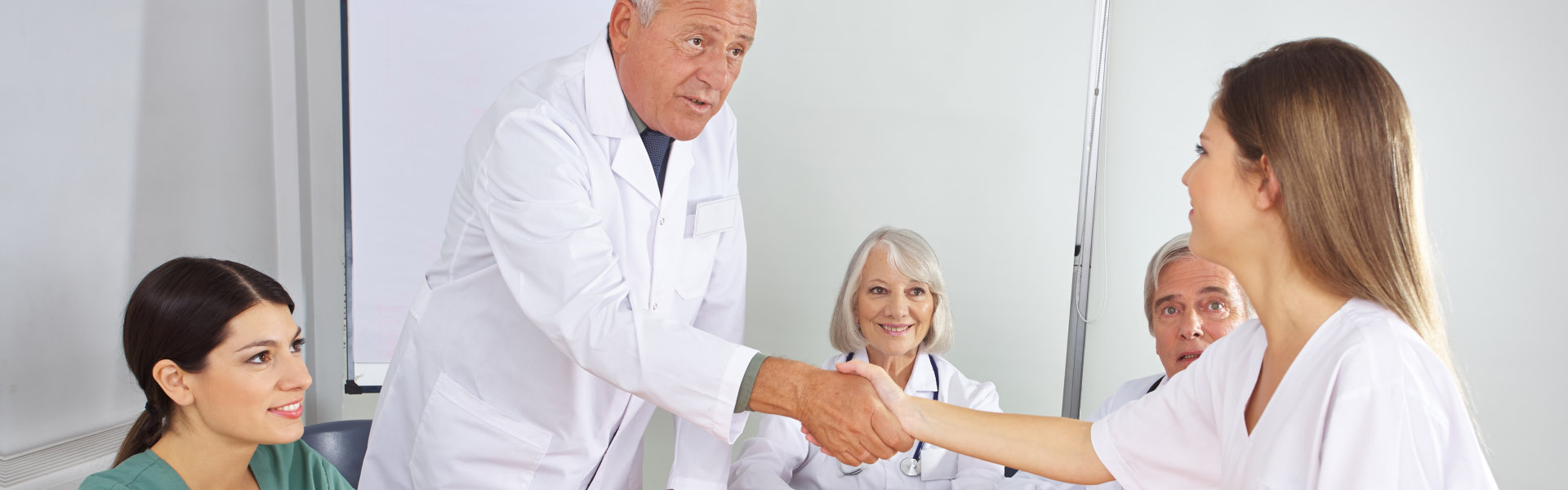 doctor and a lady doing a handshake
